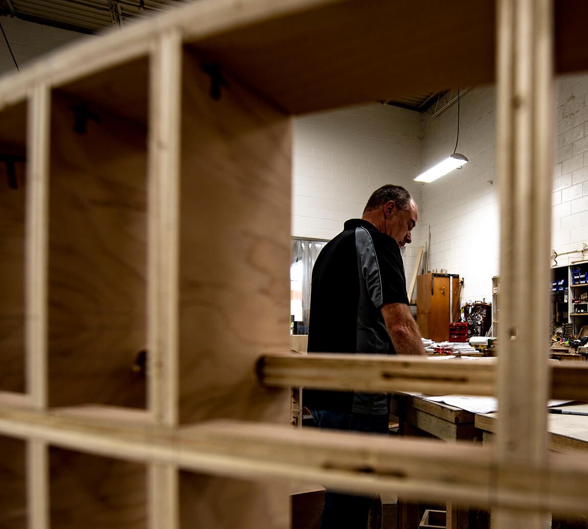 Man works in wood shop
